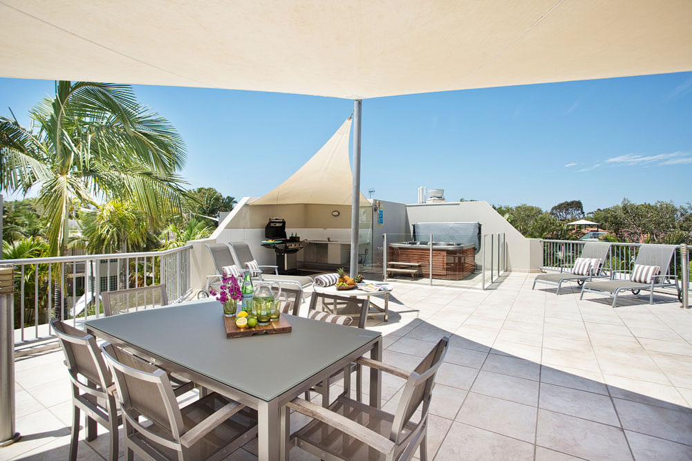 Stunning Sunshine Coast Holiday Apartments With Rooftop Spa and BBQ Facilities At Noosa Tropican